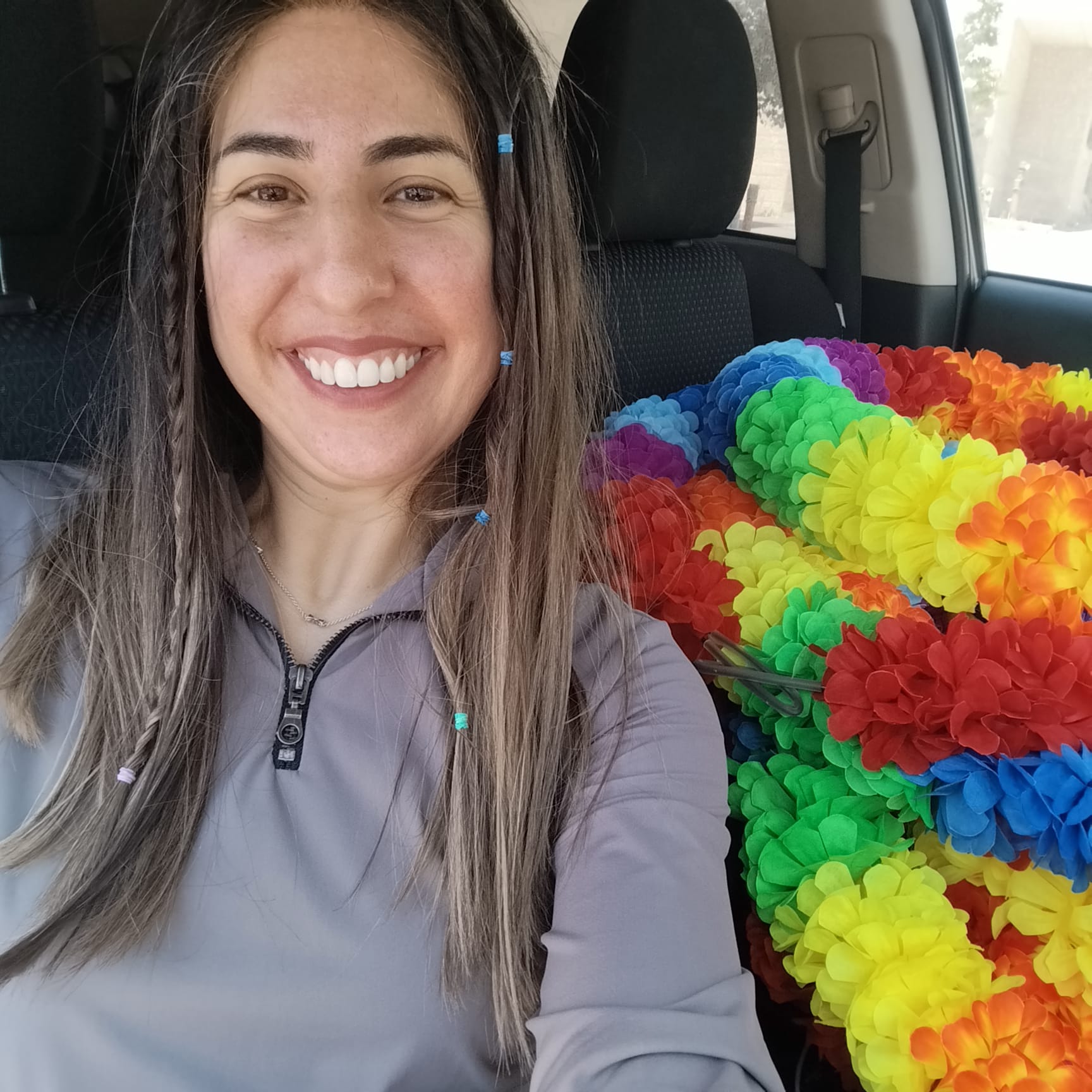 DJ Shira with colorful party decorations